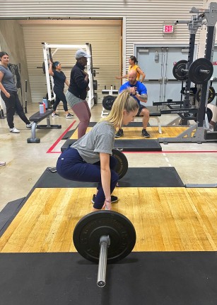 Students in the weight training area of the Finley Recreation Center