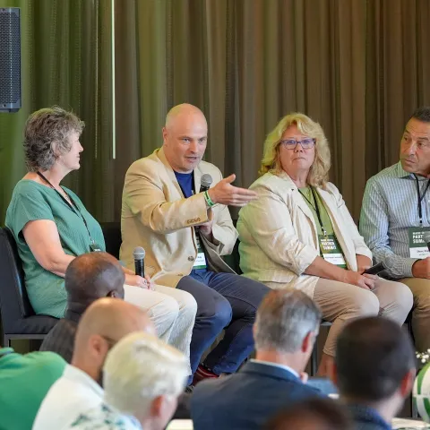 UNE's Norm O'Reilly speaks as part of a panel of sports industry experts