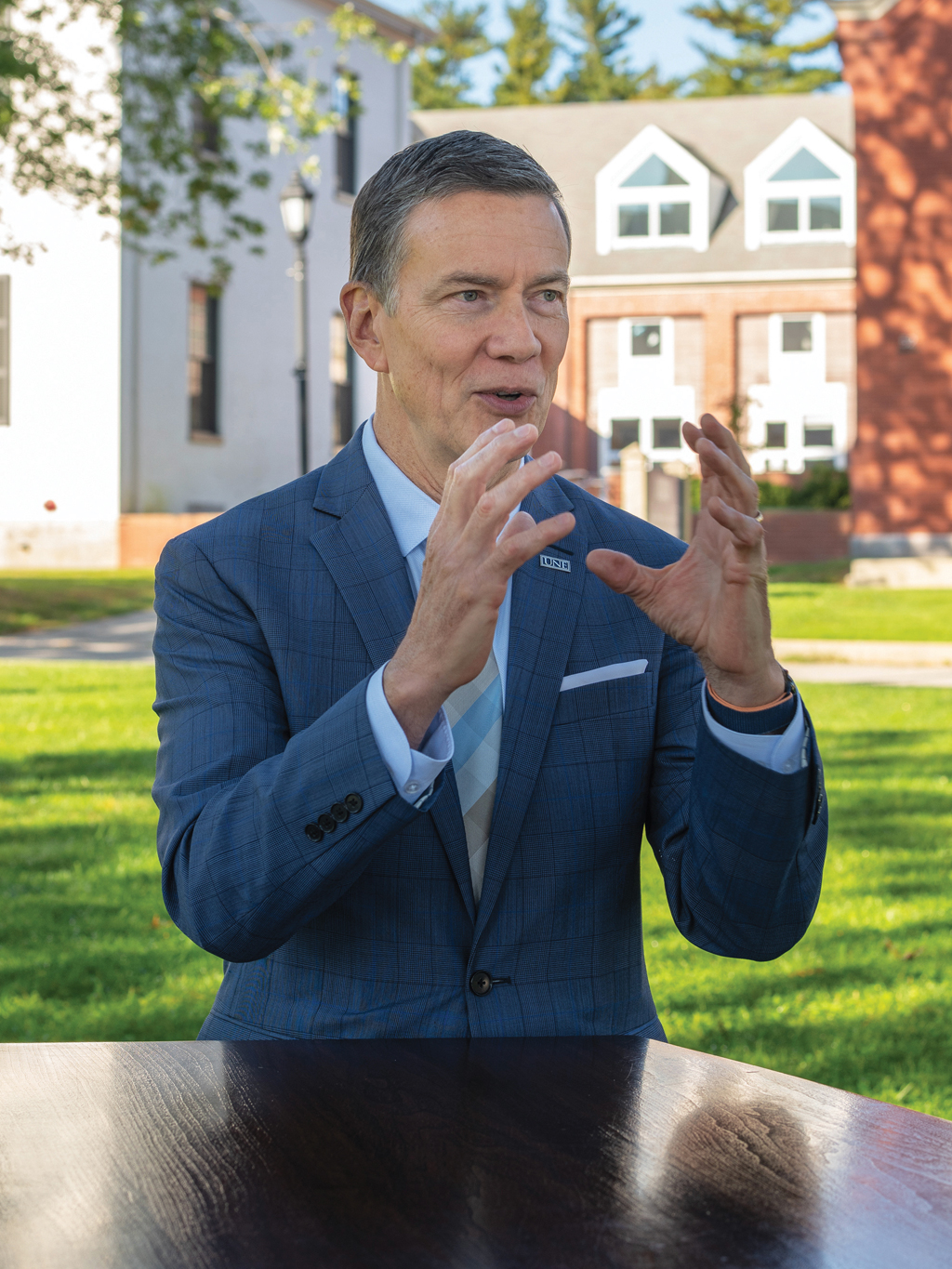 Portrait of U N E President Herbert speaking on the quad of the Portland Campus