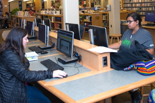 Two students sit at the computer lab in the Biddeford campus library