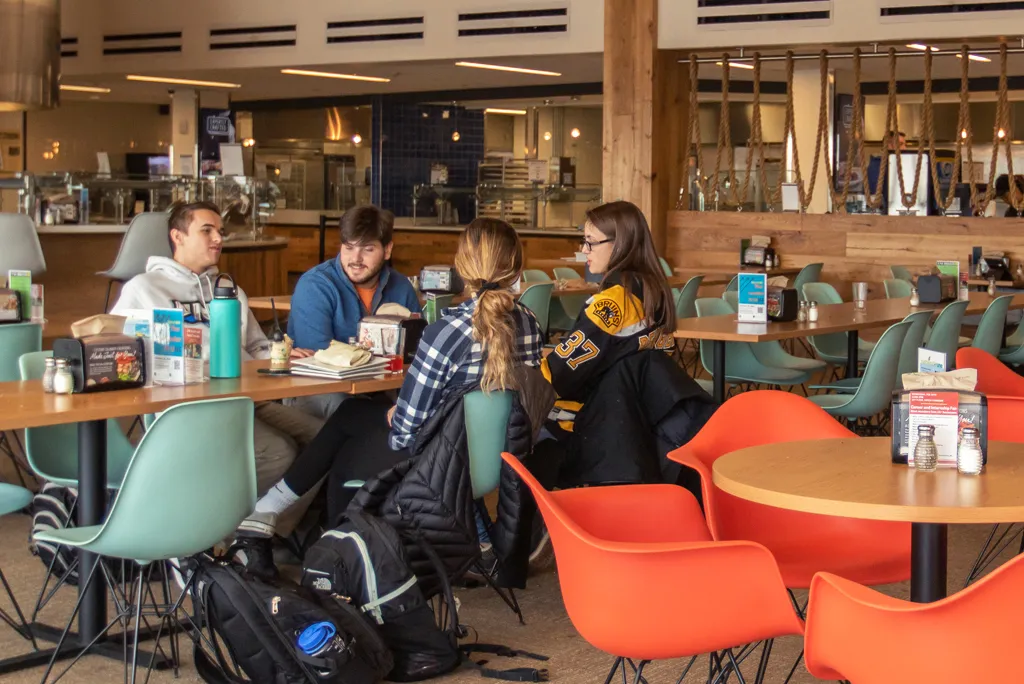 students eat in the dining area on the third floor of the Ripich Commons