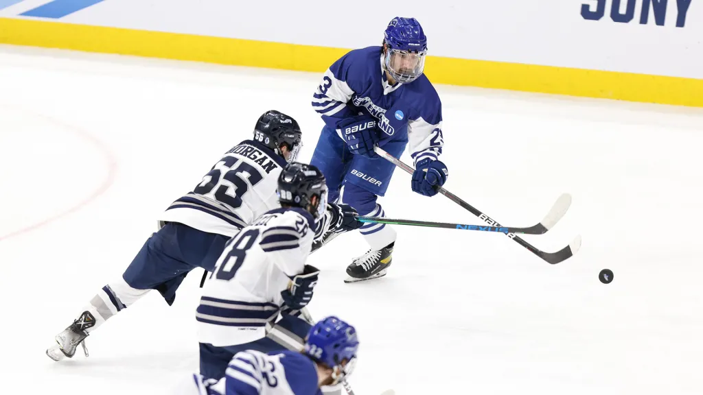 Forward Jared Christy spars for the puck