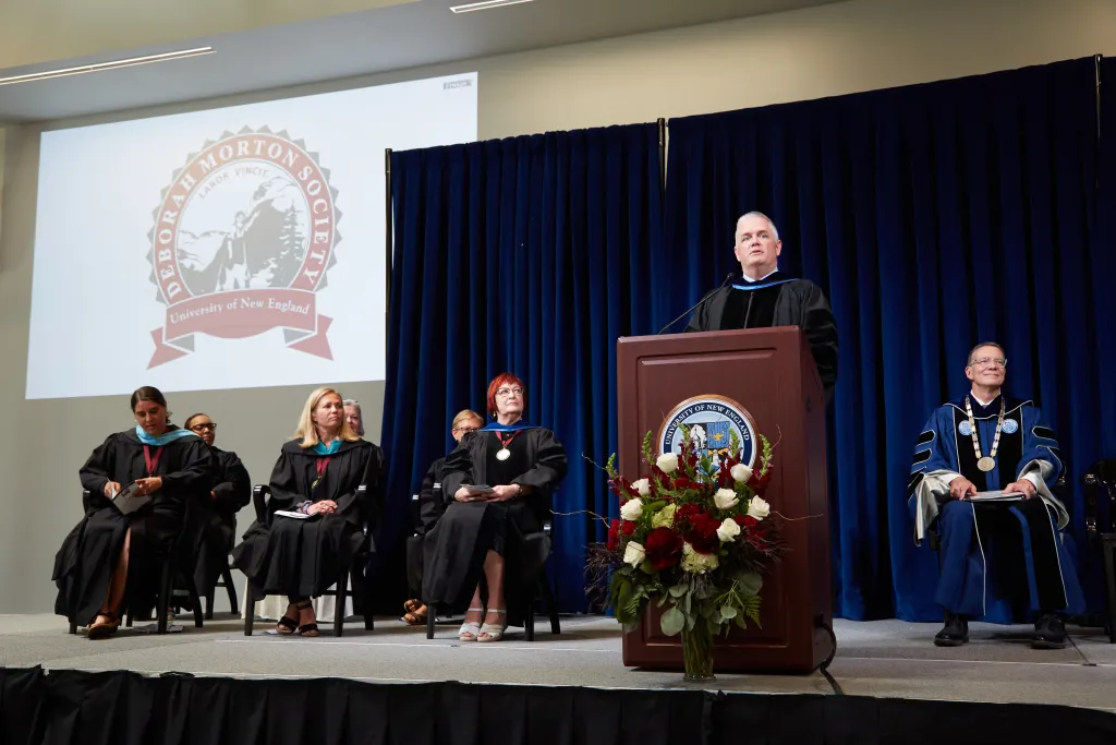 UNE Board of Trustees Chair Dan McCormack welcomes the crowd