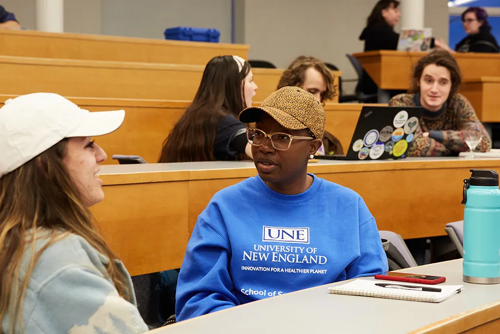 Students talking at an Environmental Council meeting