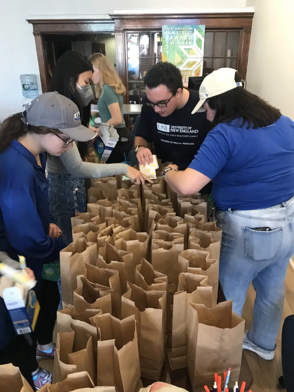 Student prepare gift bags