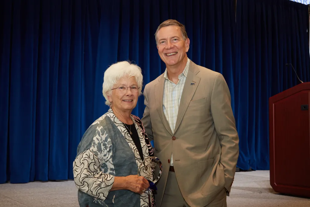 Polly Campbell and UNE President James Herbert