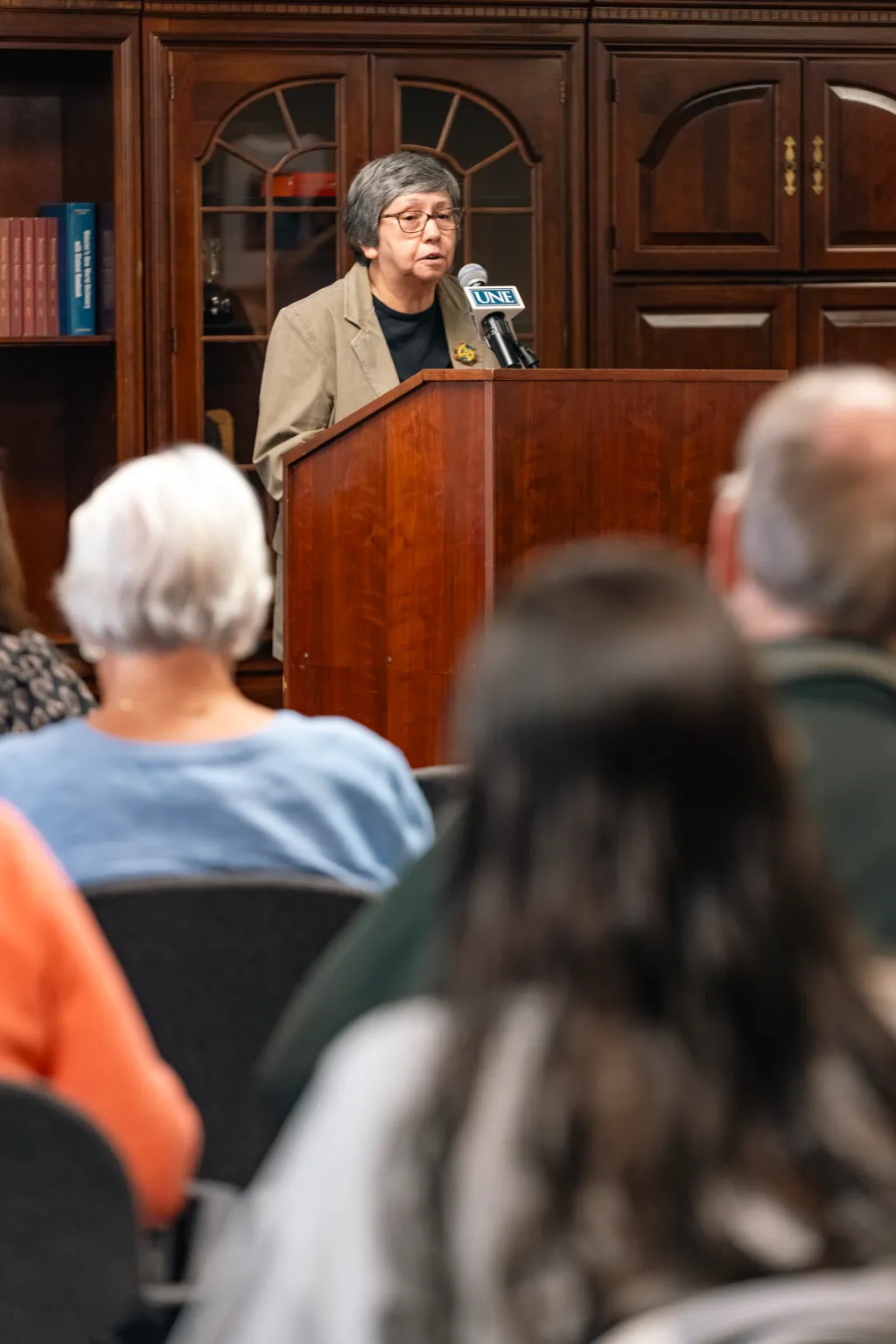 Donna Loring speaks from the podium