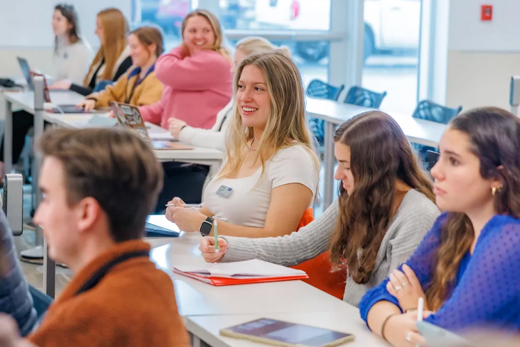 A class of physical therapy students listening to a lecture