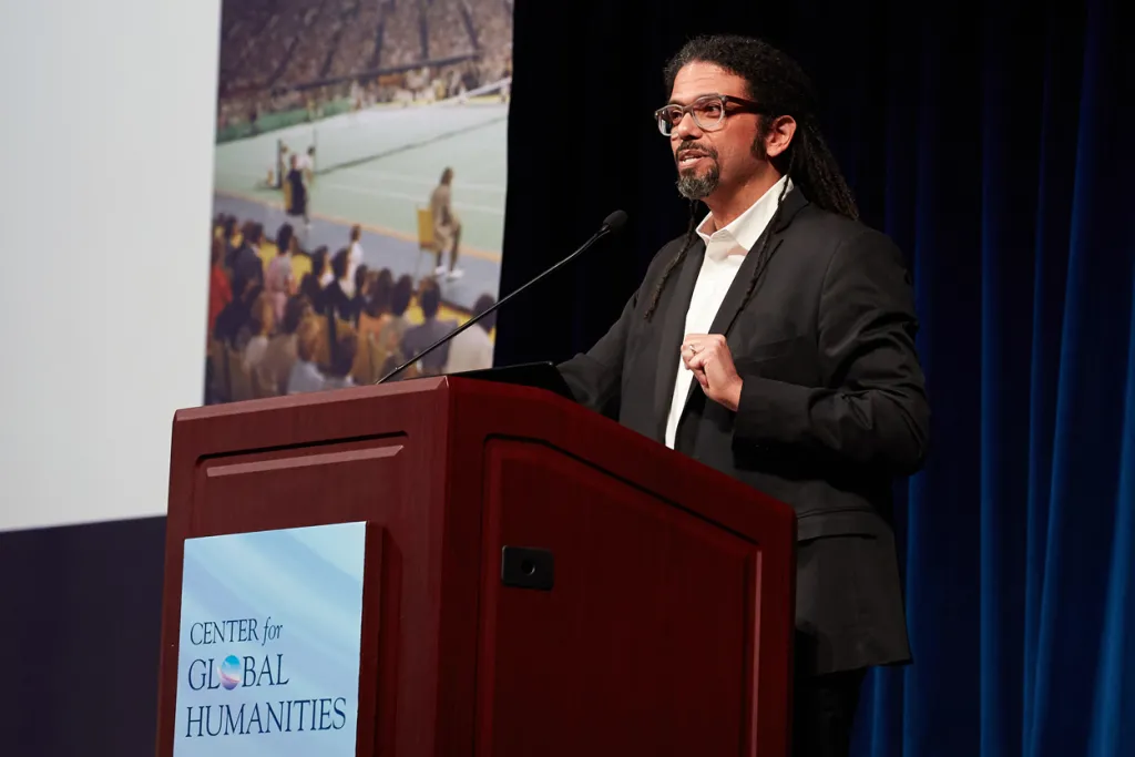 A Center for Global Humanities lecture speaker standing at podium