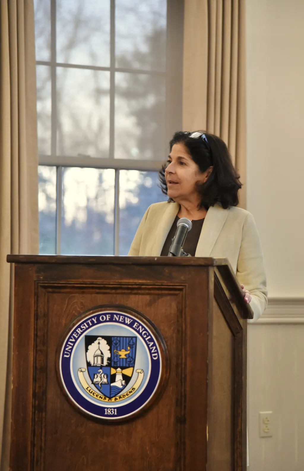 Carol Lambdin-Pattavina speaks at the podium