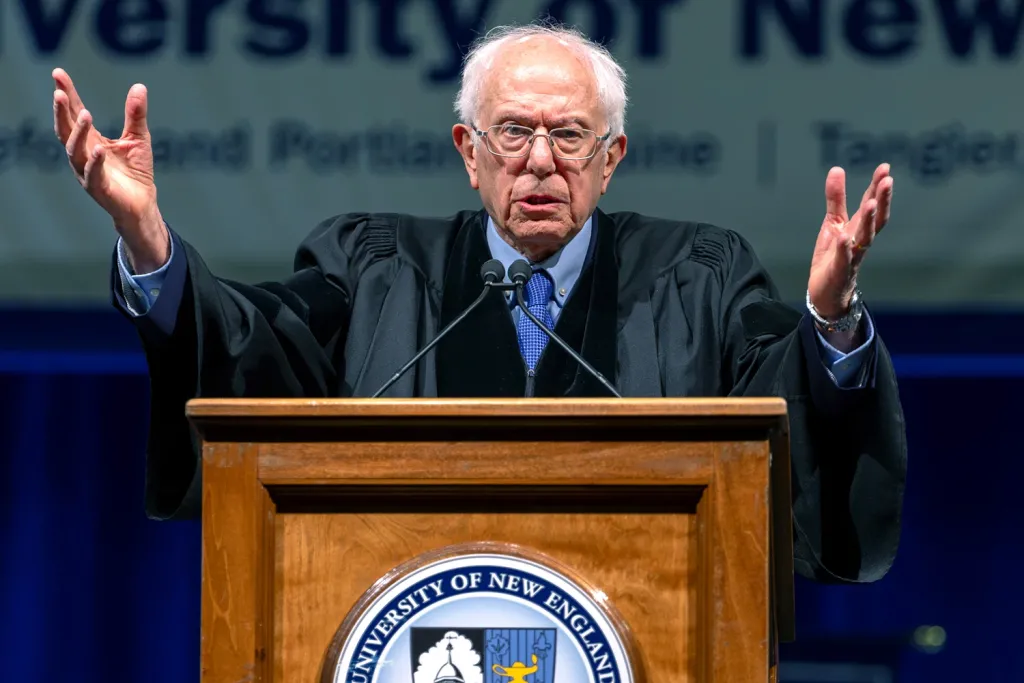 Commencement speaker Bernie Sanders addresses the crowd at the U N E 2024 graduation ceremony