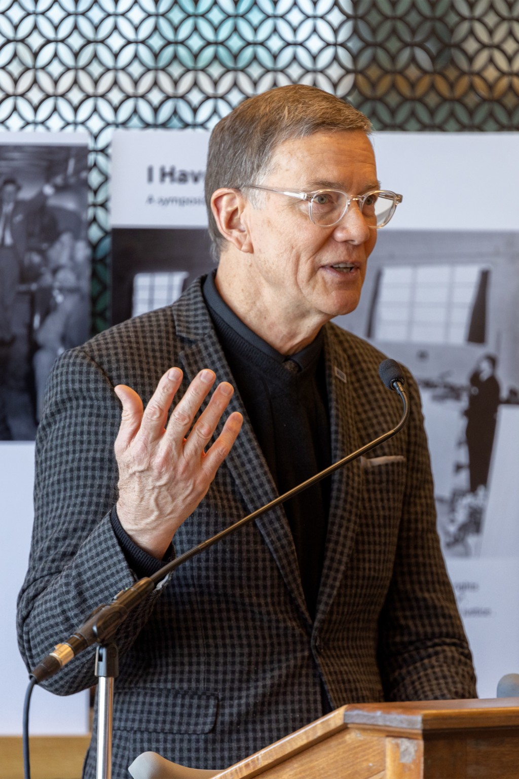 UNE President James Herbert speaks at the podium