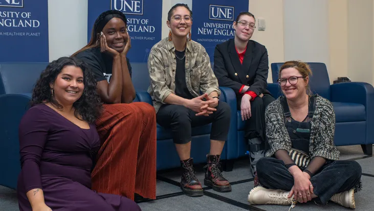 A group of students sit together at an M L K Day event