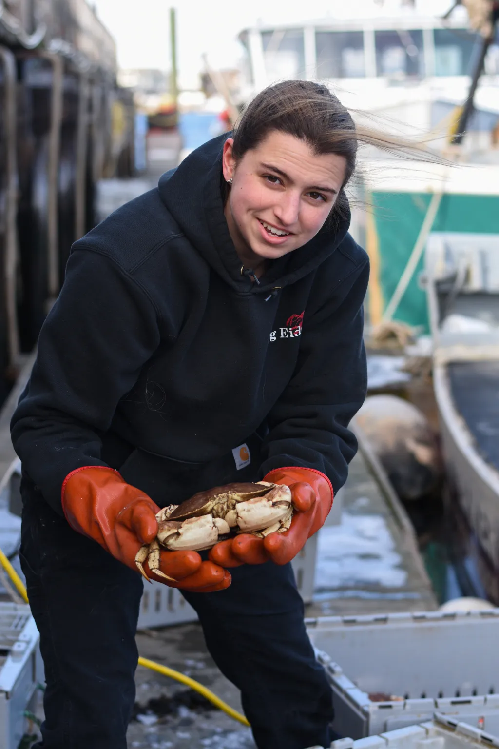 Jillian Robillard holds a crab