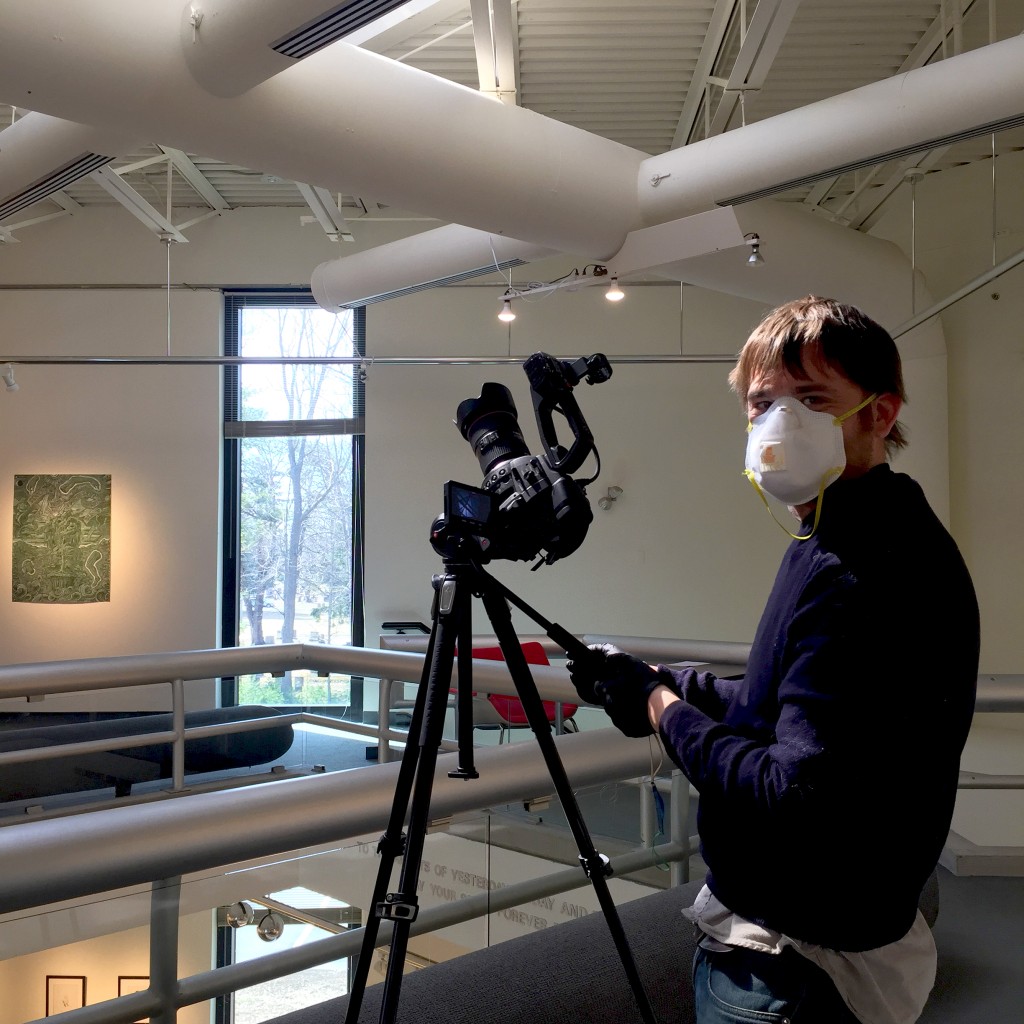 Local filmmaker John Fireman shooting video of "The House of the Soul," the current art exhibit at UNE’s Art Gallery