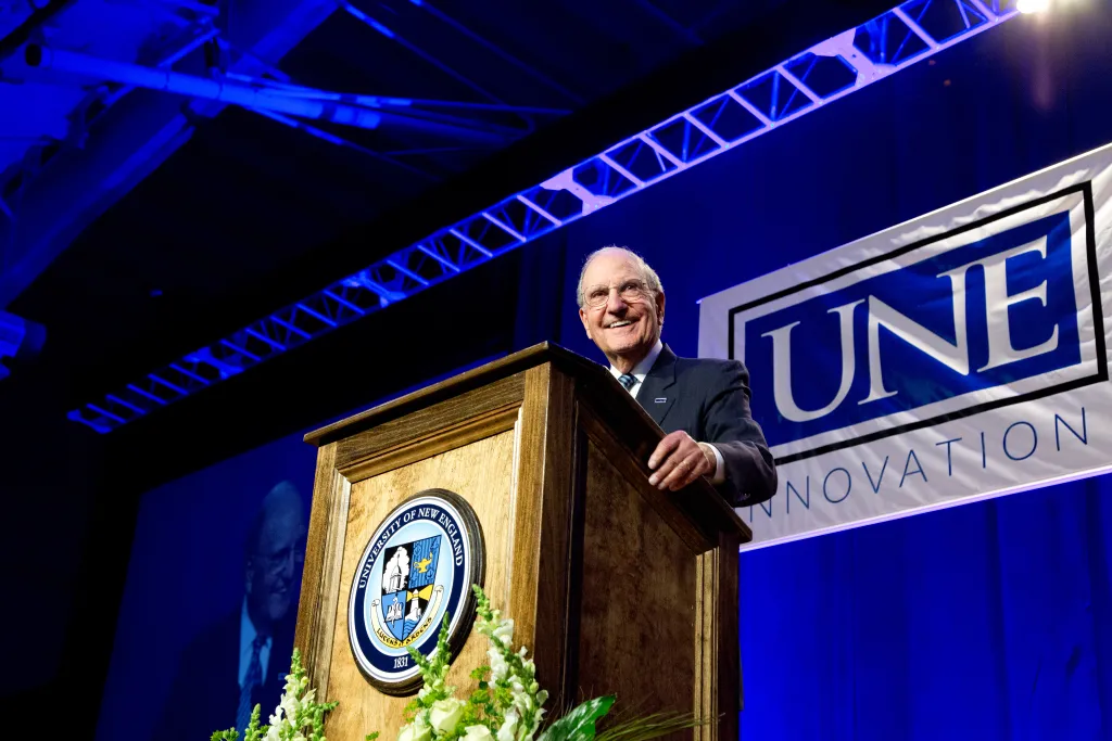 George Mitchell addresses a packed audience at the Harold Alfond Forum.