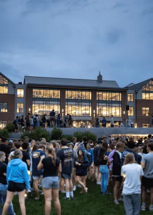 Students gather on the Commons lawn at First Night 2024