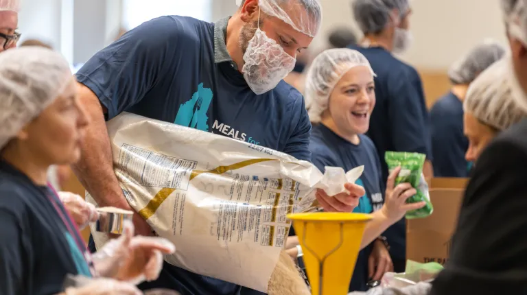 Meals for Maine volunteers prepare meal kits on Sept. 18 to help combat food insecurity.