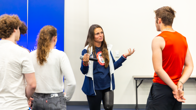 Para athlete Noelle Lambert shared her story with more than 300 UNE students. 