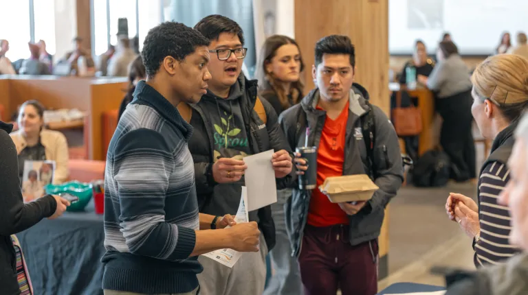 Students mingle at an organization fair in the Danielle N. Ripich Commons