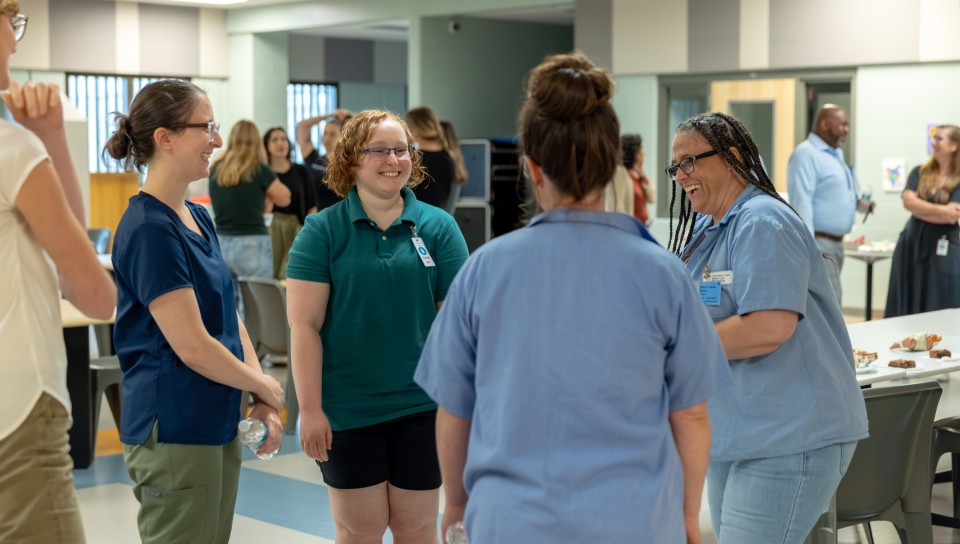 UNE students mingle with the residents of the Maine Correctional Center. 