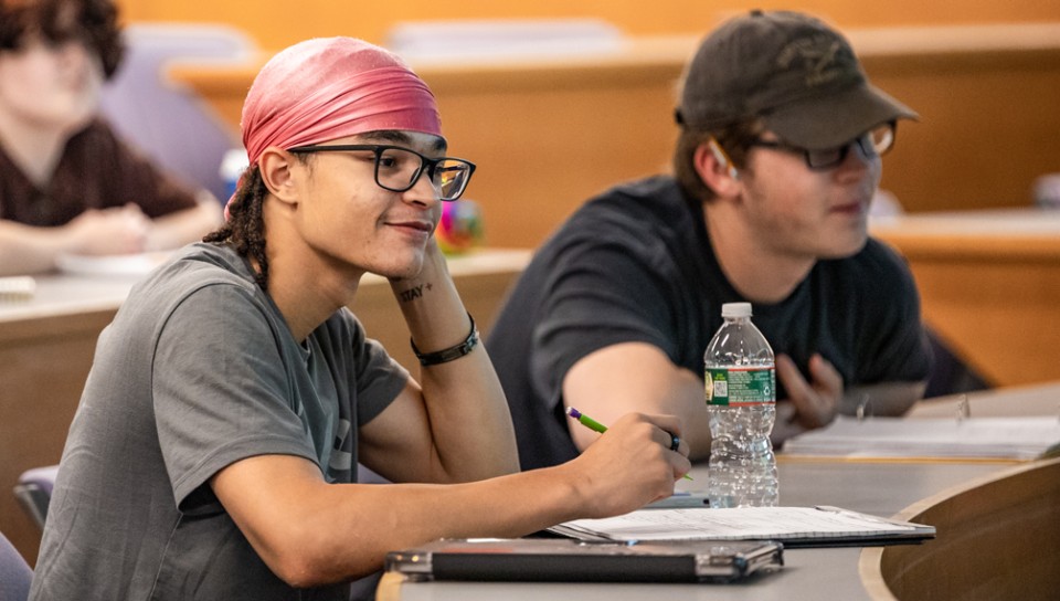 Two students sitting in a Criminology lecture