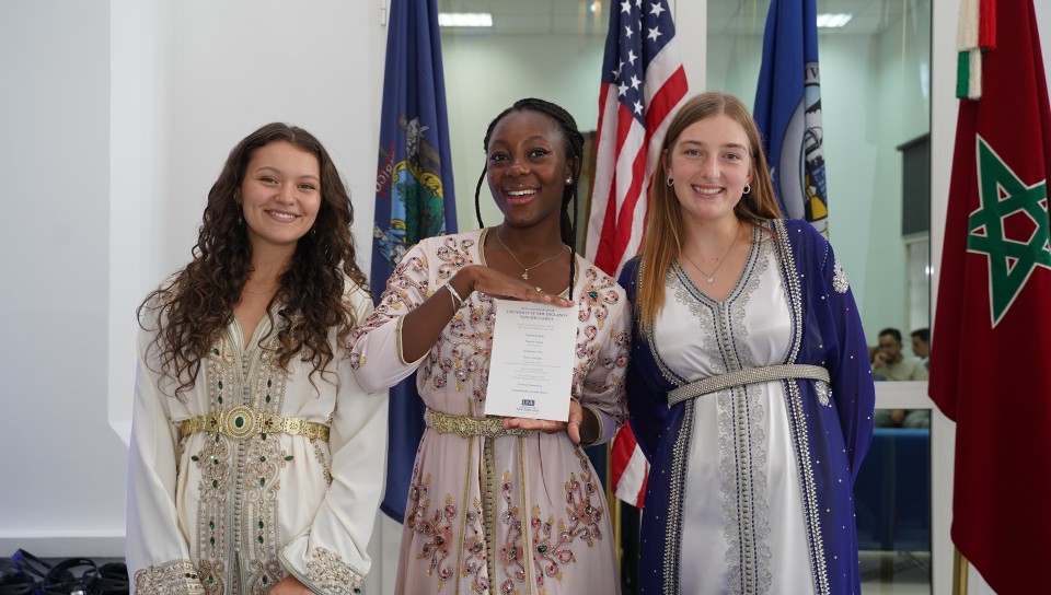 Three female students pose for a photo at the Tangier, Morocco campus