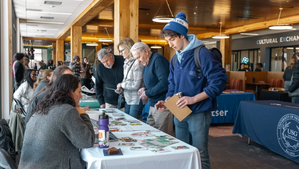 Students mingle at an organization fair in the Danielle N. Ripich Commons