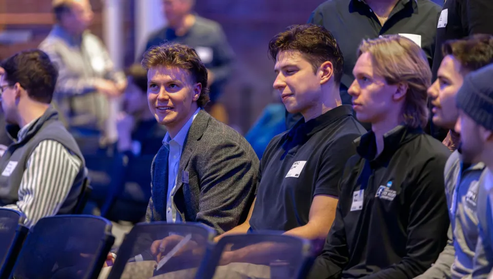 UNE students watch a panel discussion in Innovation Hall