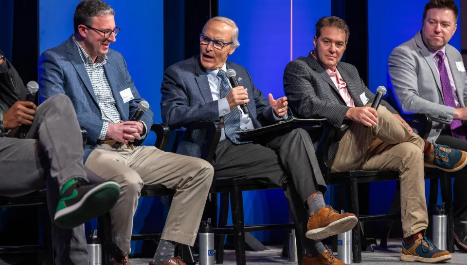 Moderator Rick Burton leads discussion 