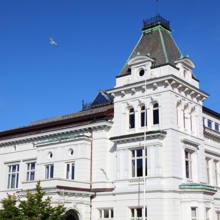 A close-up of a white Norwegian building