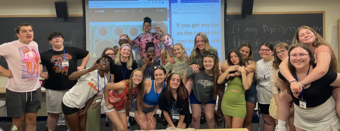 A group of high school students poses for a photo making funny faces