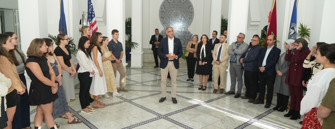 Ambassador Talwar speaks to students and faculty in the main hall of the Tangier Campus building