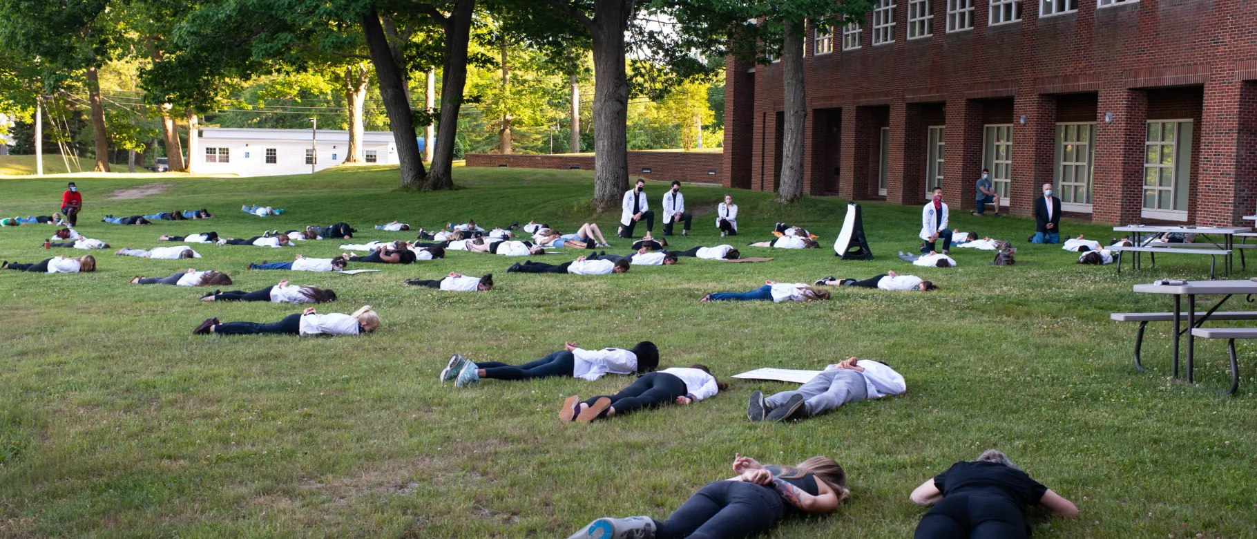 About 70 UNE community members lay face down or kneel in protest of police brutality and systemic racism on June 12.