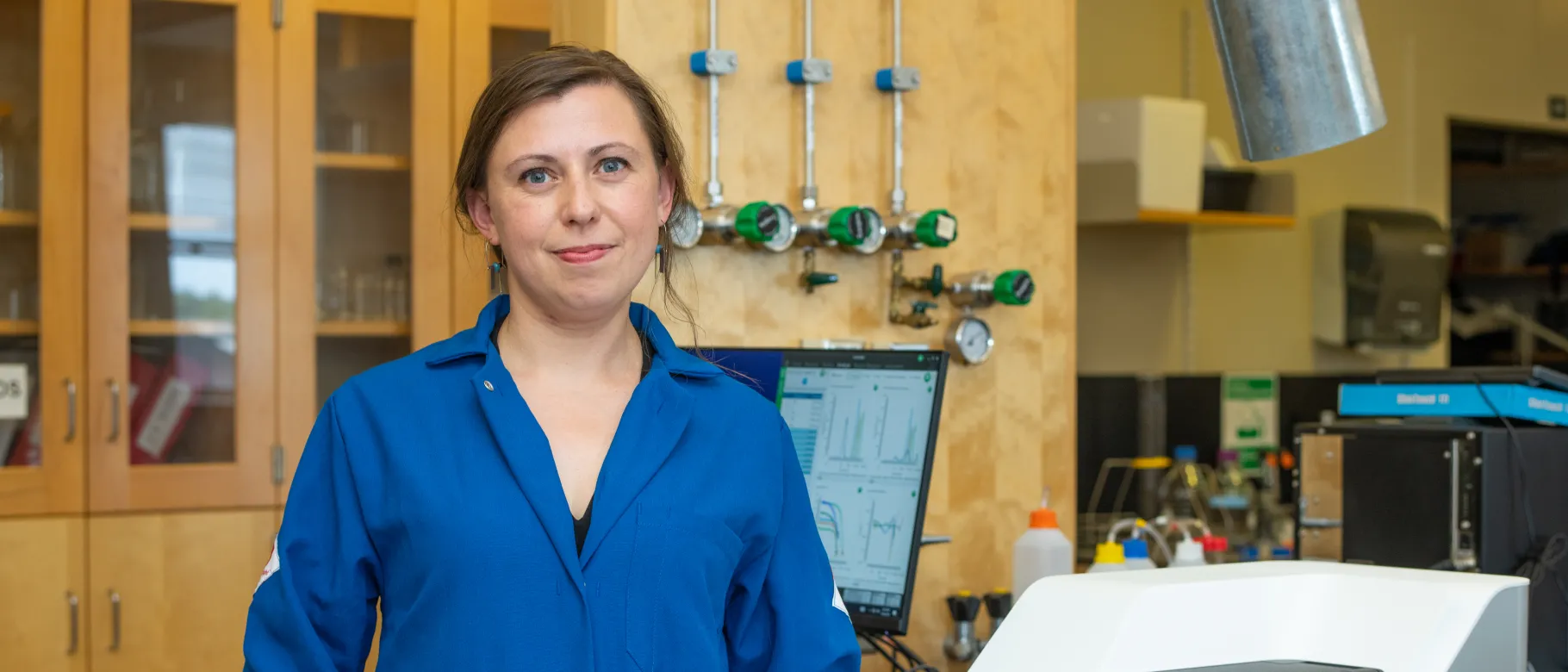 Eva Balog poses for a portrait in her lab