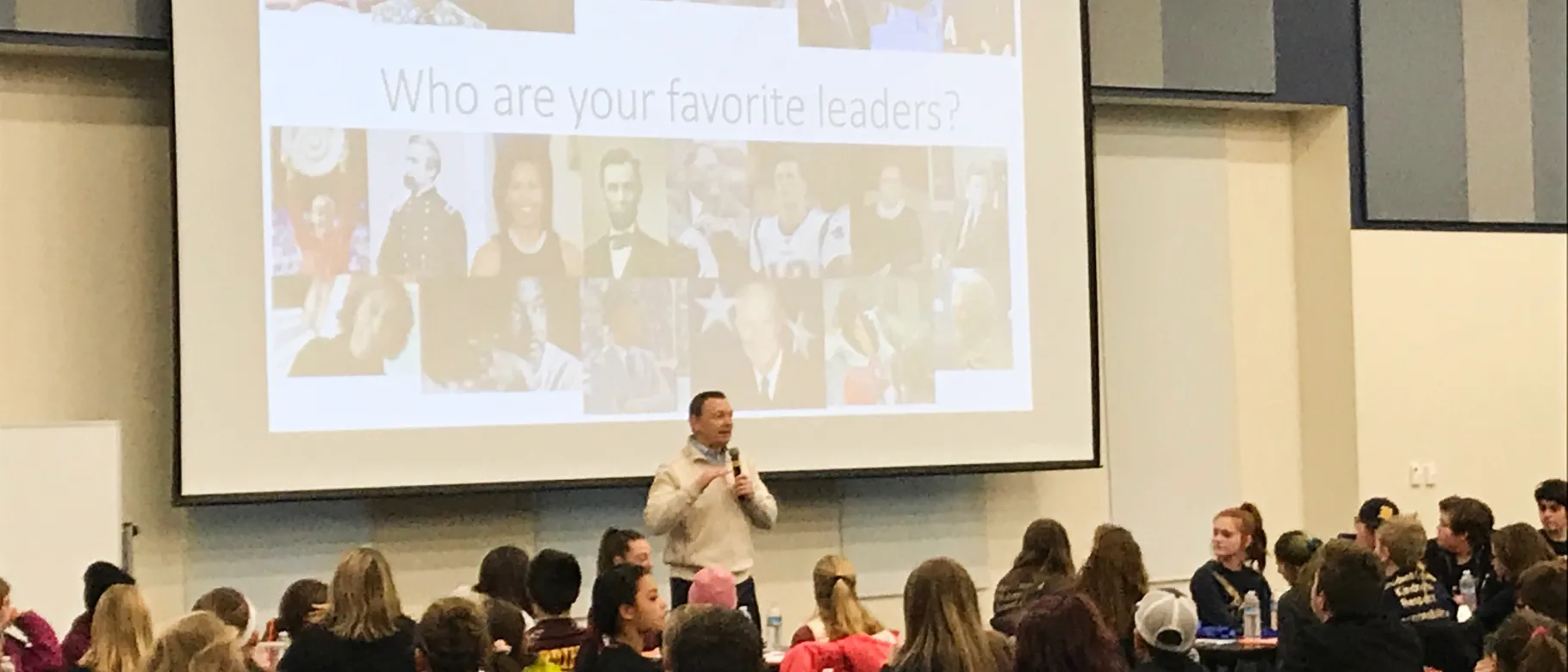 Yarmouth Superintendent of Schools Andrew Dolloff talks to middle school students about leaders they may know 