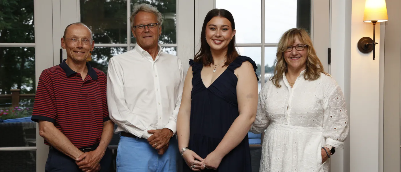 Abbie Anderson poses with Justine Bassett, Michael Sheldon, and Ford Reiche