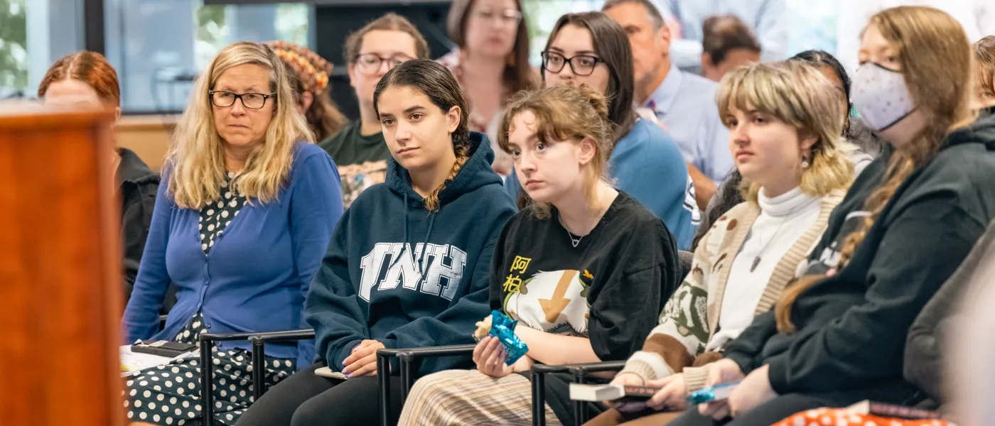 Students sit in the audience