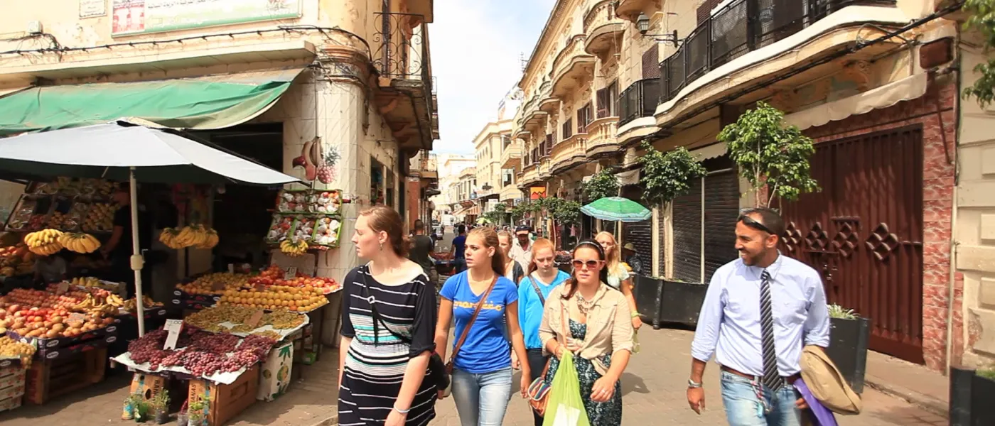 Students walking together through the streets of Tangier.