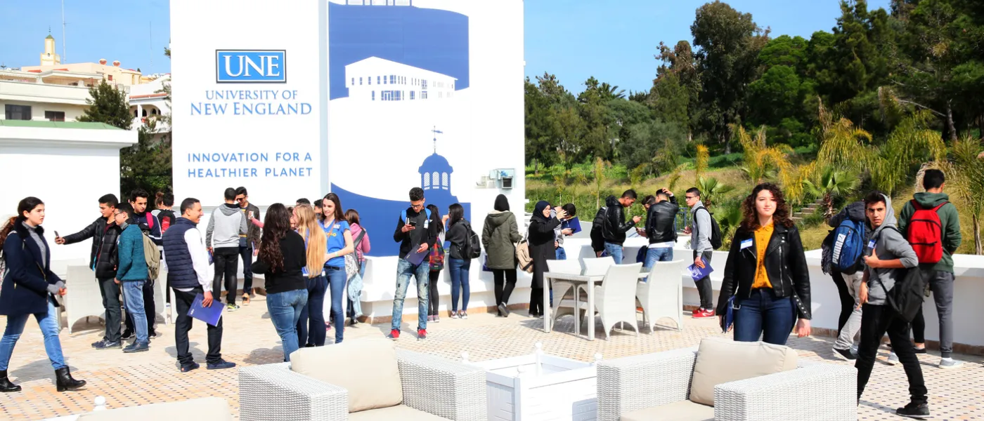 Moroccan students on UNE Morocco rooftop during tour