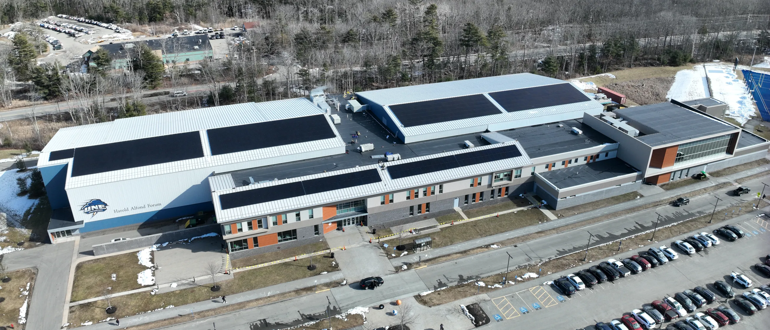 Aerial image of solar panels atop the Harold Alfond Forum