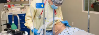 student practicing giving anesthesia