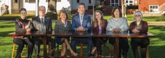 President Herbert and U N E faculty on the Portland Campus