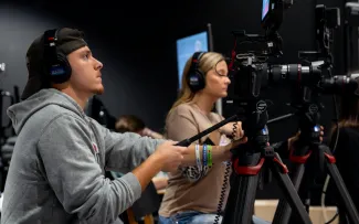 UNE students film an interview with an ABC News executive in the new Nor'easter Production Studio