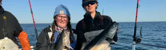 Amelia Burbidge and Evan Kamoen fish off the coast of Maine. 