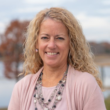 Headshot of Sandy DeLuca