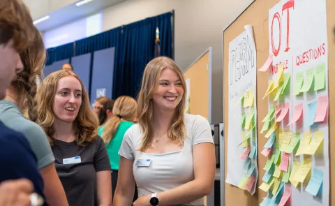 UNE health professions students complete an interactive case study in Innovation Hall 