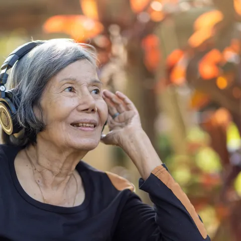 woman listens to music