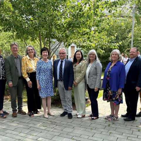 A group of Maine biomedical researchers poses with Sen. Susan Collins