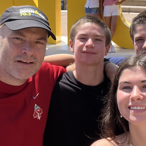 UNE's Norm O'Reilly poses with family in a plaza in Nice, France